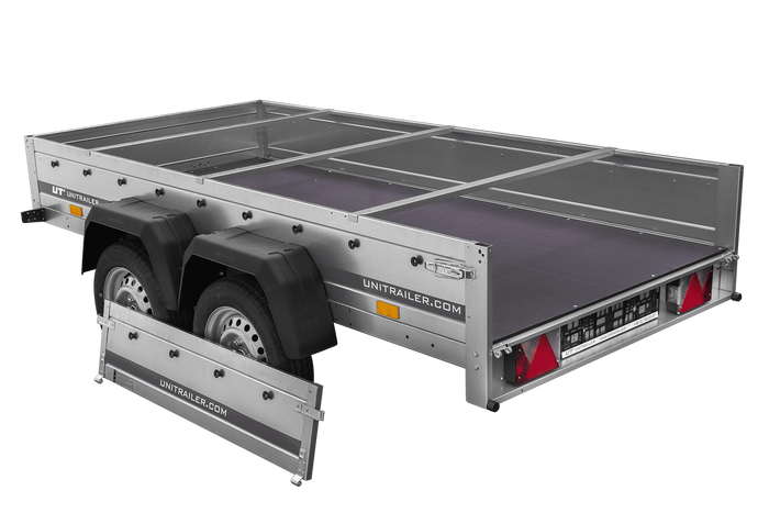 Przyczepka dwuosiowa 264x125 UNITRAILER GARDEN 264/2 KIPP ze stelażem H-0 i plandeką niebieską